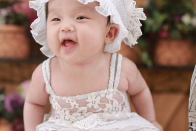 Smiling Baby With Bonnet